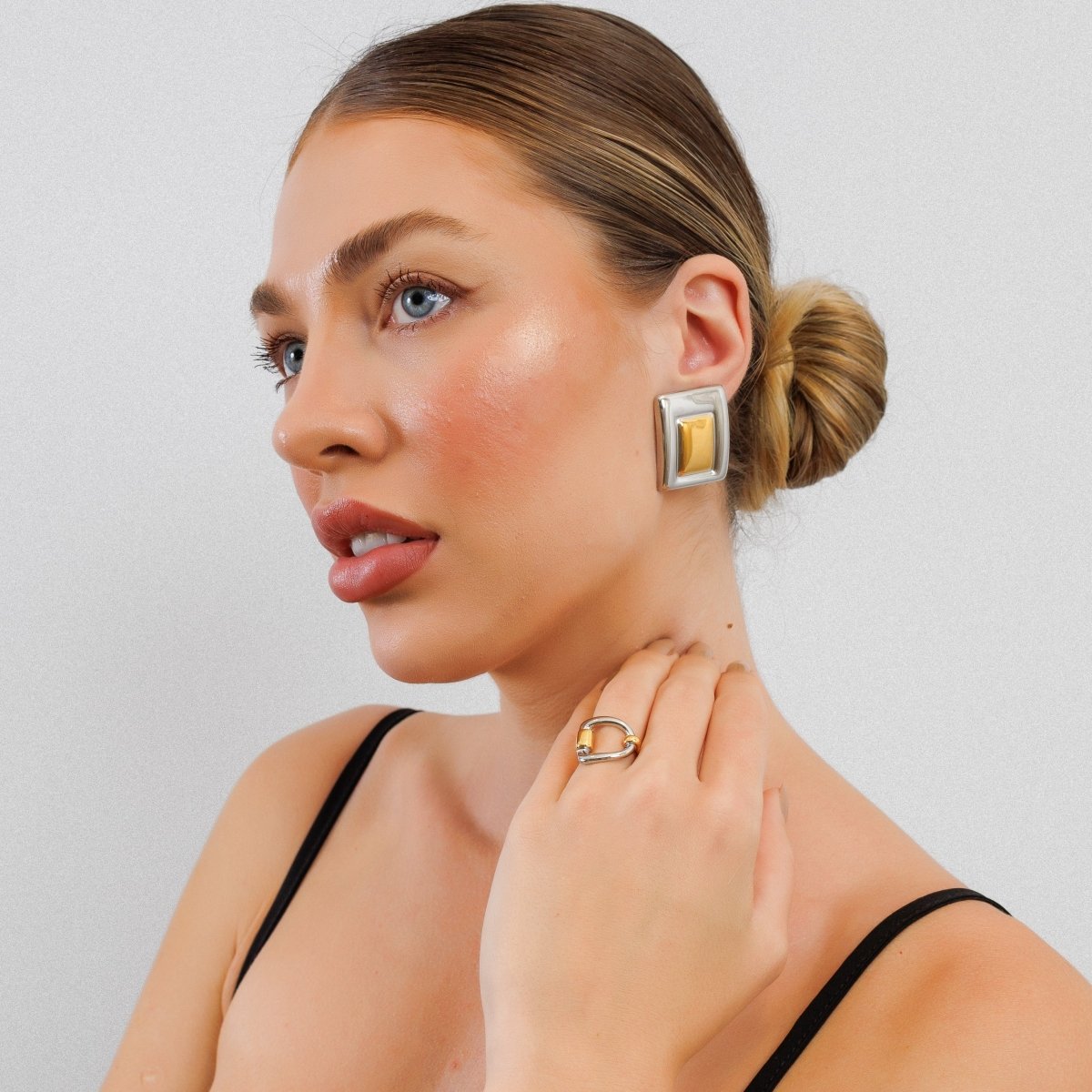 Adjustable Duo Link Ring with a Mix of Gold and Silver Plating